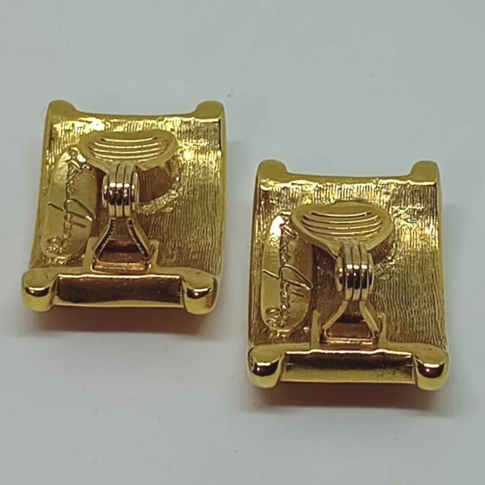 * vintage Ginnie Johansen red & gold tone clip on earrings